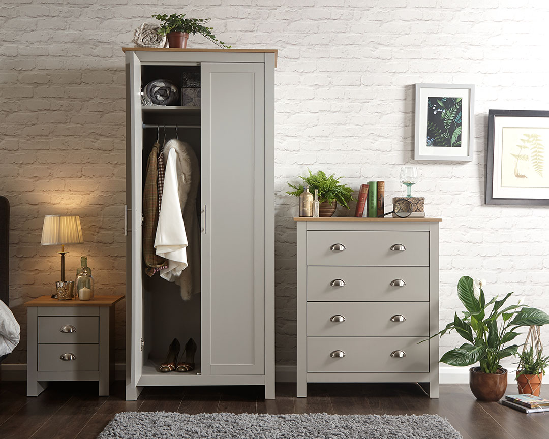 Lancaster 3 piece bedroom set in grey. Includes 2 door wardrobe, bedside lamp table and 4 drawer chest